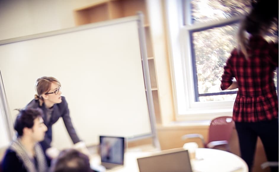 Students working through a project-based design challenge — research on evidence-based design and innovation education
